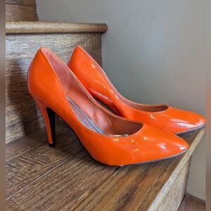 Pointy toe orange patent heels by Red circle. Women's size 10